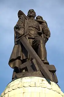 Warrior Liberator statue at the Soviet War Memorial in Treptower Park, Berlin.