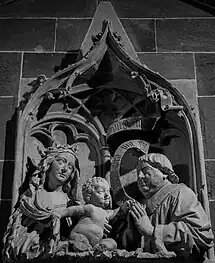 Canon Conrad de Bussnang praying to Virgin and Child. (15th c.)