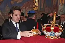 Prince Philip placing the Royal Orb near the Karađorđević Crown, 2013