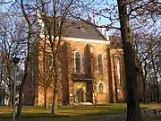 Brick Gothic St-Bartholomew Church (14th–16th centuries) and its bell tower