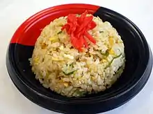 Chahan fried rice on a plate, molded into the shape of a dome.