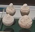 Miniature clay stupa models