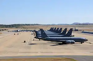 Several KC-135R Stratotankers of the 117th Air Refueling Wing parked on the flight line at Sumpter Smith Joint National Guard Base.