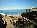 The steps down to the beach. The wooden board walk runs off to the beach bar and restaurant to the right.