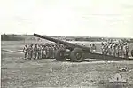 Armistice day service beside 155mm heavy gun at Fort Lytton 11 Nov 1943.