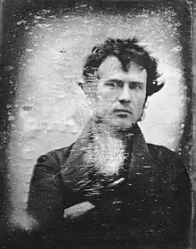 The oldest surviving photographic self-portrait by Robert Cornelius, 1839.