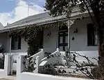 This Victorian house is situated on a piece of land which was sold in 1853 to E. French and forms an important element in the street scene of Church Street, Tulbagh. Type of site: House Previous use: Residential. Current use: House.