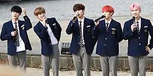 A.C.E busking in Banpo-dong, November 2019From left: Chan, Donghun, Jun, Kim Byeongkwan, Wow