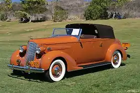 1936 Packard One-Twenty Convertible Victoria with the top in the semi-open (second) position