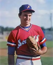 A baseball player in red