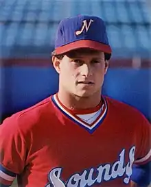 A baseball player in red