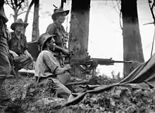 Australian soldiers using a captured Type 92 machine gun.