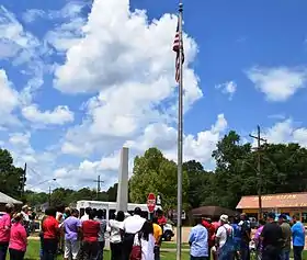 Kentwood residents observe a noontide Day of Prayer in front of the Town Hall in 2015