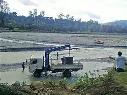 Public works in the river in Suco Daisua, Same, Manufahi