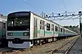 A Joban Line 209–1000 series EMU, November 2011