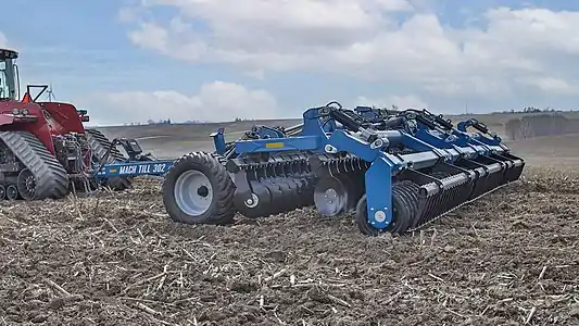 Kinze Mach Till in field