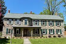 Stone house with Victorian embellishment