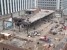 View of the top floor as workers demolish parts of the old structure