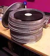 A 35 mm release print in the form that it would typically be delivered to a theatre in Europe.  Each can contains roughly 2,000 feet of film, or 20 minutes of running time at 24 fps.