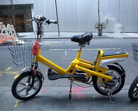 Yellow electric bike on West 54th Street