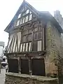 Timbered house in Street Dom Maurice