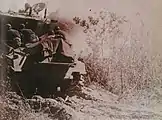 717th Tank Battalion carrying 79th Infantry Division soldiers into combat near the Rhine.