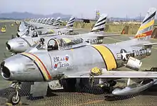 North American F-86F-30-NA Sabres of the 8th Fighter-Bomber Group, Korea, 1953. Serial 52-4877 in front in Wing Commander's colors, 52-4473 alongside