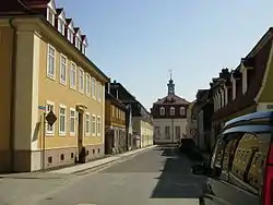 Street in a town, a church building at the end