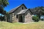 The original Settlers Church on this site was opened in 1827. This church was destroyed by fire during the Frontier War of 1835 and thereafter rebuilt. It was again seriously damaged by the Xhosas in 1846. The church was built in 1823 by the Settlers themselves.
Type of site: Church.