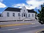 The designer of the Drostdy building was M L Thibault, the well-known architect. Construction started in 1804, was completed in 1810. Today the Drostdy forms part of the historic core of Uitenhage.
Type of site: Drostdy.