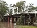 Old North Bourke bridge, in flood, northern side, North Bourke (2021)