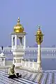 A Sikh devotee by the sarovar at Gurdwara Tarn Taran Sahib.