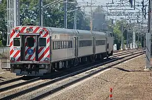 A typical built Mafersa cab car with a P40DC at Old Saybrook