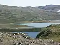 Color differential - fresh water of Aajuitsup Tasia, and meltwater of unnamed outflow lake of Russell Glacier