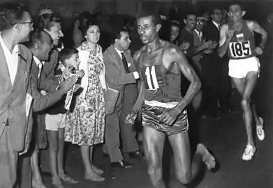 Abebe leading Rhadi ben Abdesselam behind him