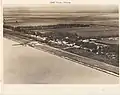 Aerial view, E, of Canal Point, Florida, from over Lake Okeechobee.