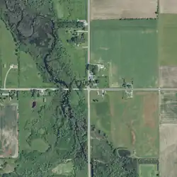 The four roads leading into Carnot are North Carnot Road, East Carnot Road, South Carnot Road, and West Carnot Road. Stony Creek (left) flows southeast.