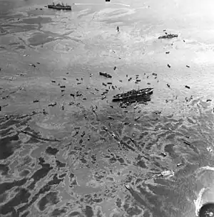 Aerial view of USS Mindanao after the explosion of Mount Hood at Seeadler Harbor on November 10, 1944