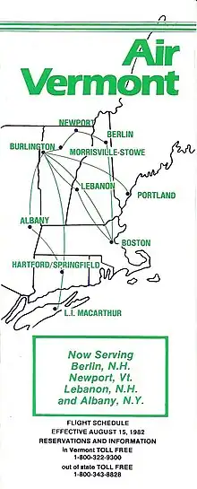 The cover of the timetable has a map of the New England states of America with destinations served by the airlines.