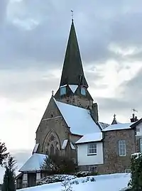 Church of All Saints and churchyard wall and railings