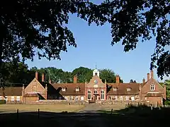 Alnutts Hospital and attached forecourt walls and gate