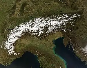 Image 34Satellite photo showing the Alps in winter, at the top of the Italian peninsula. (from History of the Alps)