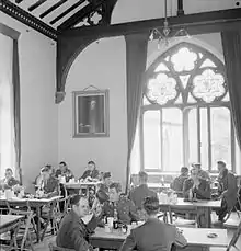 Photograph of American service personnel relaxing in the Bishop's Palace during the Second World War