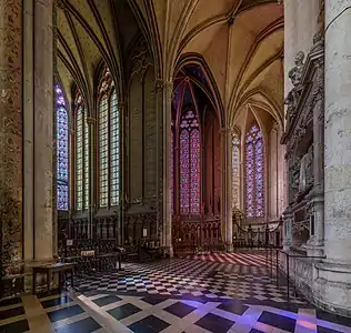 Stained glass windows in the ambulatory