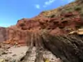 Angular unconformity of Triassic rocks overlying steeply-tilted Carboniferous rocks at Praia do Telheiro, Portugal