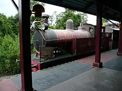 A deliberately distressed steam outline diesel locomotive built in 1997 for the Wildlife Express Train at Disney World.