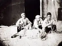 Men with a live lion in Persia, photographed by Antoin Sevruguin (1830s – 1933)