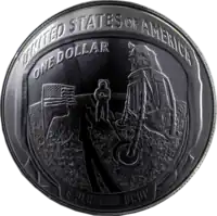 A coin with a scene from the moon landing engraved in it, as well as the words "United States", "One dollar", and the Latin phrase "E Pluribus Unum"