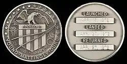  Apollo 16 mission emblem and crew names (front). Dates (launch, lunar landing, and return) (back)