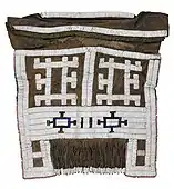 A beaded apron or meputo; late 19th-early 20th century; hide, glass beads, metal beads, straw; 46.9 × 50.8 cm (18.5 × 20 in.); Birmingham Museum of Art (Alabama, USA)